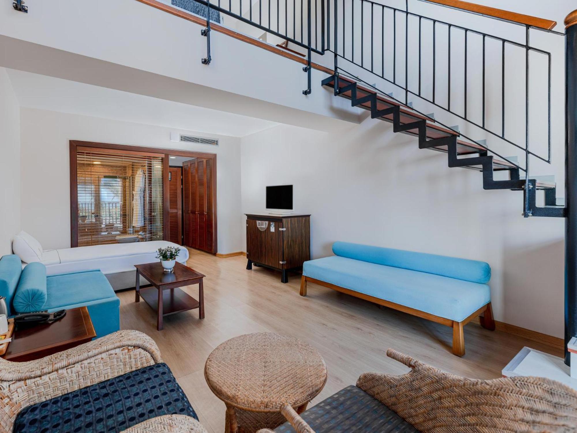 Asteria Family Resort Belek Antalya Exteriör bild A living room in a suite at the hotel